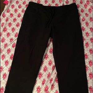 Black plus scrub pants